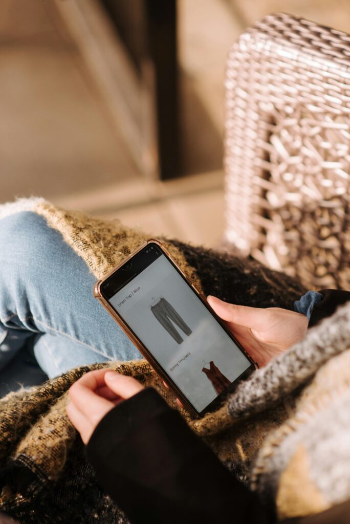 person viewing ecommerce store on phone