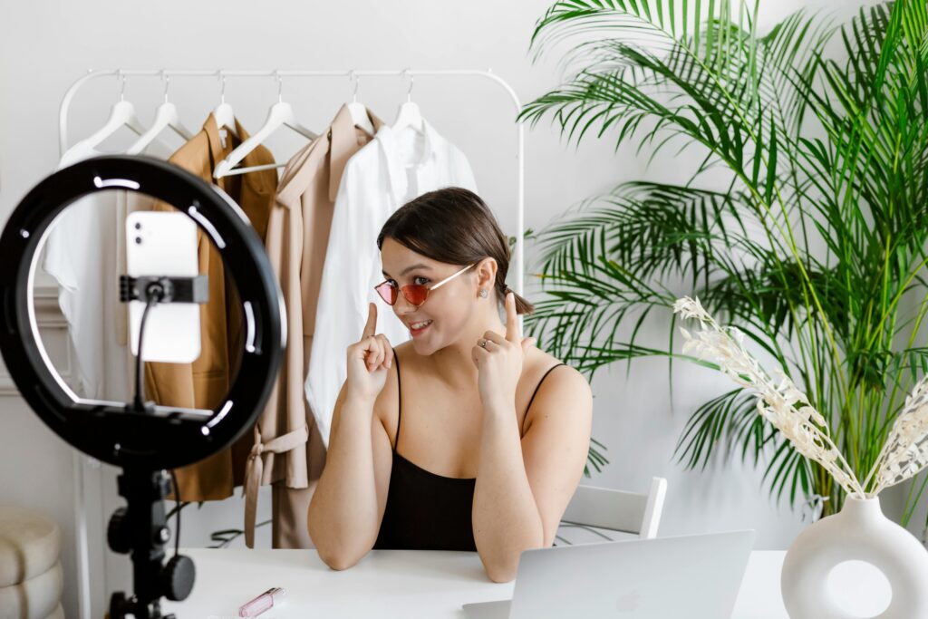 Influencer in front of a ring light.